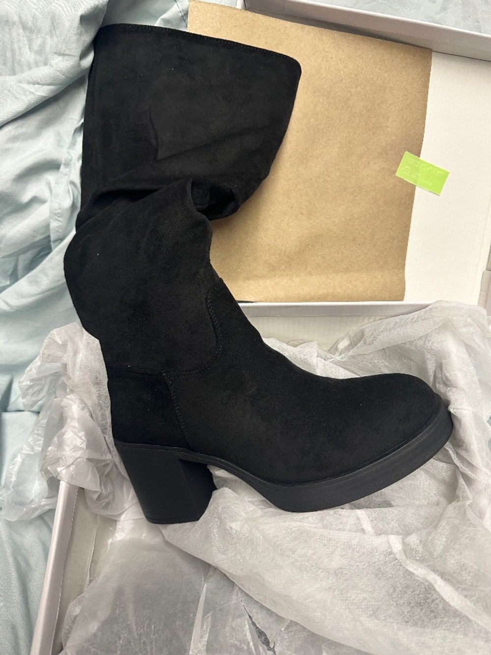 Knee high black boots